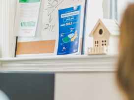 mortgage loans written on a white board posted flyers